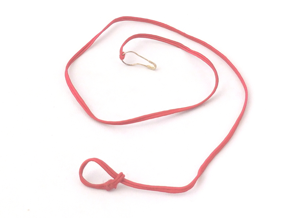 To begin any of these styles, pull the cord up to make a loop wide enough to fit the pin through. Pic #1: Opening the loop
