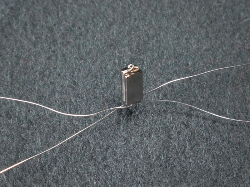 The usual round magnets were too wide, but this grooved-side rectangle looked feasible. It took a while to locate and order, and other projects took over for a while. Pic #3: New magnet