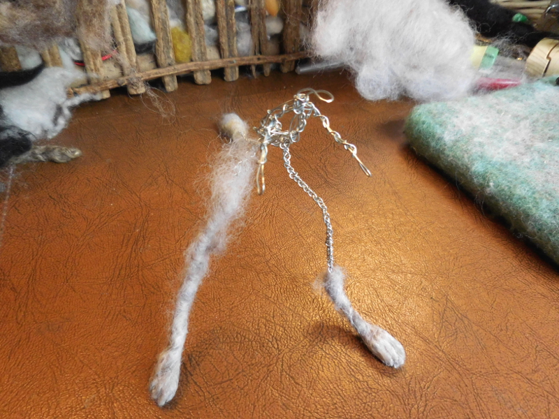 Both feet, with a start at felting the leg through the wire. Yeah, it’s fuzzy at this point, that doesn't matter. Pic #9: Two feet