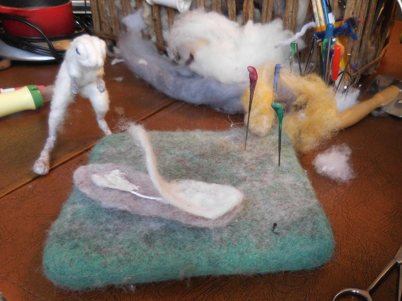 No matter how much rolling, ironing, and felting the layers got, the three-part ear was still way too thick. Note the disgusted look on the earless jerboa. Pic #28: Ear sandwich