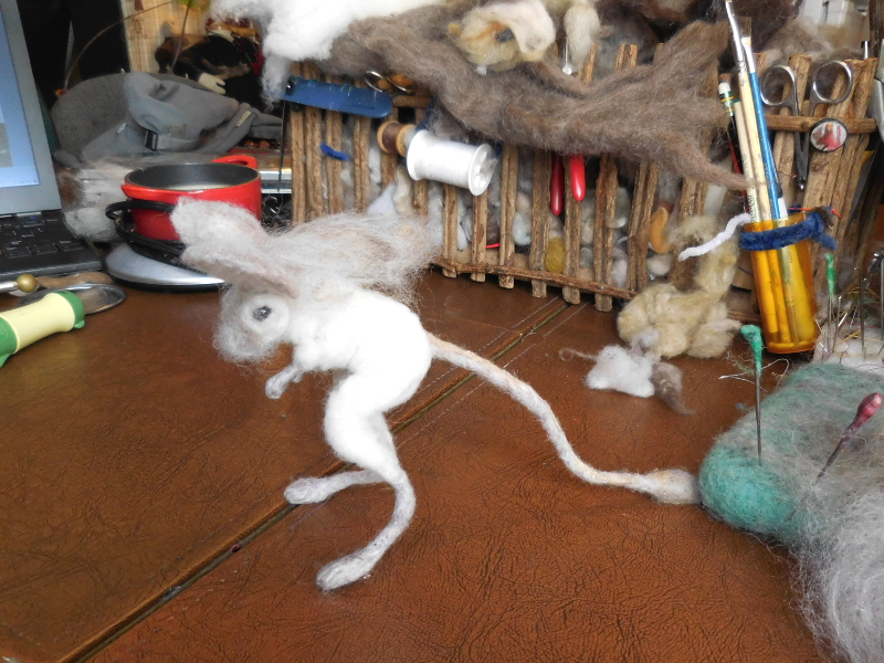A layer of the color coat neatly disguises the place where the ear piece crosses the head. Pic #32: Hiding ear seams