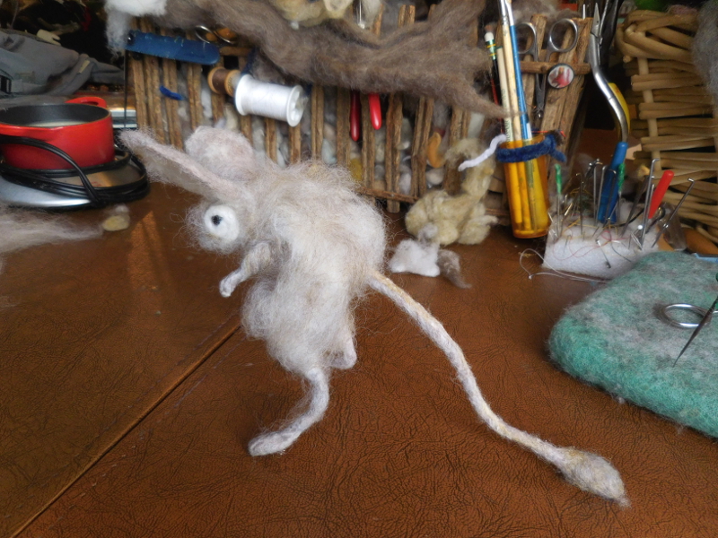 To get an even color coat, it helps to start with a loose layer all over the figure. Pic #34: Covered with fuzz